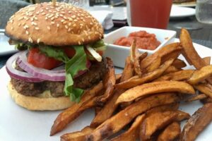 Vegan impossible burger and Fries on the patio
