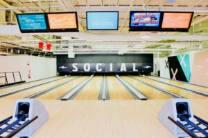 bowling lanes and scoreboard at Radio Social