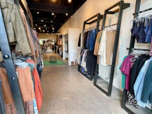 Clothing racks inside Salty Boutique