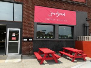 Entrance with picnic tables