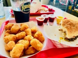 Tater tots, beer, and burger at Swillburger