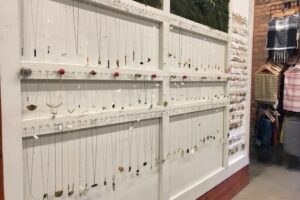 A wall of necklaces at Peppermint