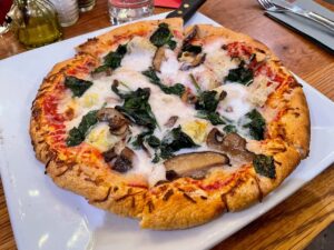 The MAG Pizza at The Gate House made vegan with vegan cheese and artichokes instead of the breaded & fried eggplant.