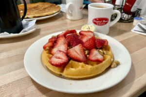 Vegan Belgian Waffle with strawberries and walnuts