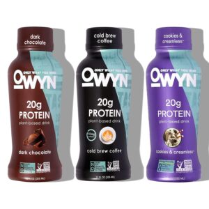 Three OWYN protein shakes. Flavors are Chocolate, Cold Brew, and Cookies and Creamless