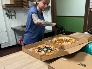 Squatcho's making pizza