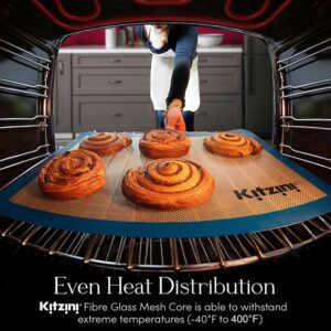 Silicone baking mat in an oven with cinnamon rolls on top