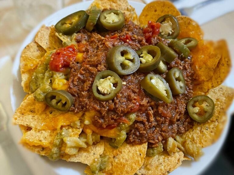 Nachos loaded with salsa, vegan cheese, vegan meat sauce, and jalapenos at The Red Fern