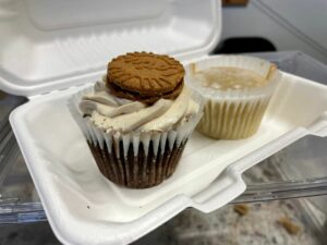 Chocolate cookie cupcake and a lemon glaze cupcake
