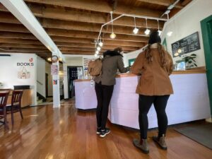 Customers ordering coffee at Bookeater