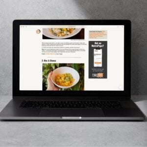 MetroPops blog page with side bar ad shown on a laptop.