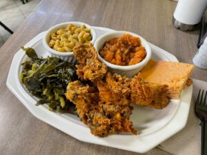 Fried "Chicken" dinner with fried oyster mushrooms, candied yams, collard greens, mac & cheese, with jalapeno cornbread