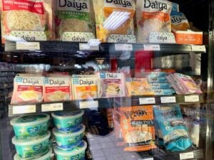 Vegan cheese options at Green Planet Grocery.