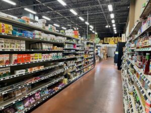 Aisle of products at Lori's including pasta and condiments.