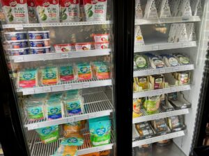 Vegan Cheese options in a cooler at Lori's Natural Foods.