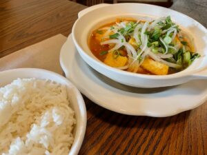 Vegan Fried Tofu in Tomato Clay Pot dish with white rice