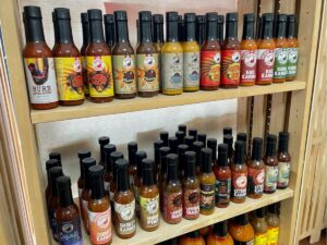 Hot sauce options at Red Bird Market