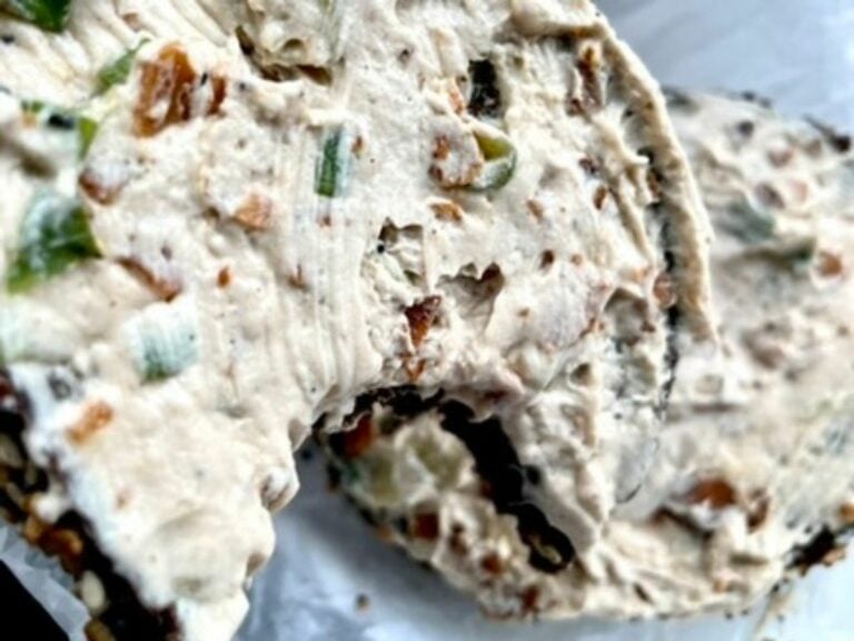 New Coconut Bacon Scallion Vegan Cream Cheese on an everything bagel