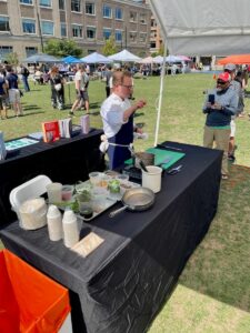 Ryan Jennings of Sweet Pea doing a cooking demo at the Rochester VegFest