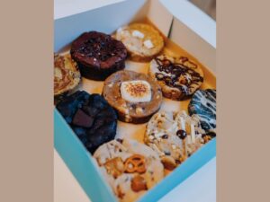 9 different flavor varieties of The Crooked Crumble's vegan deep dish cookies